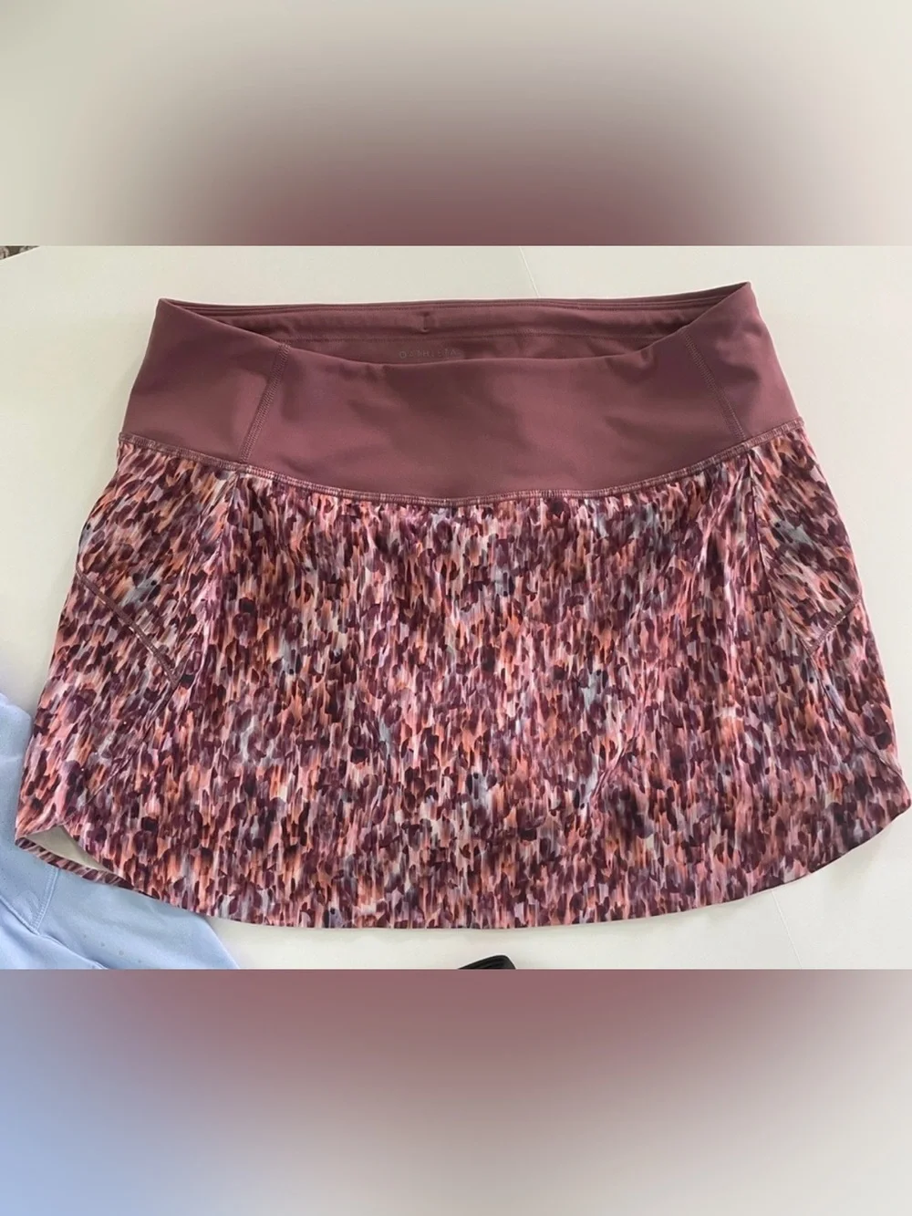 ATHLETA “Run with it “ 14 inch SKORT abstract print NEW W/0 Tags.